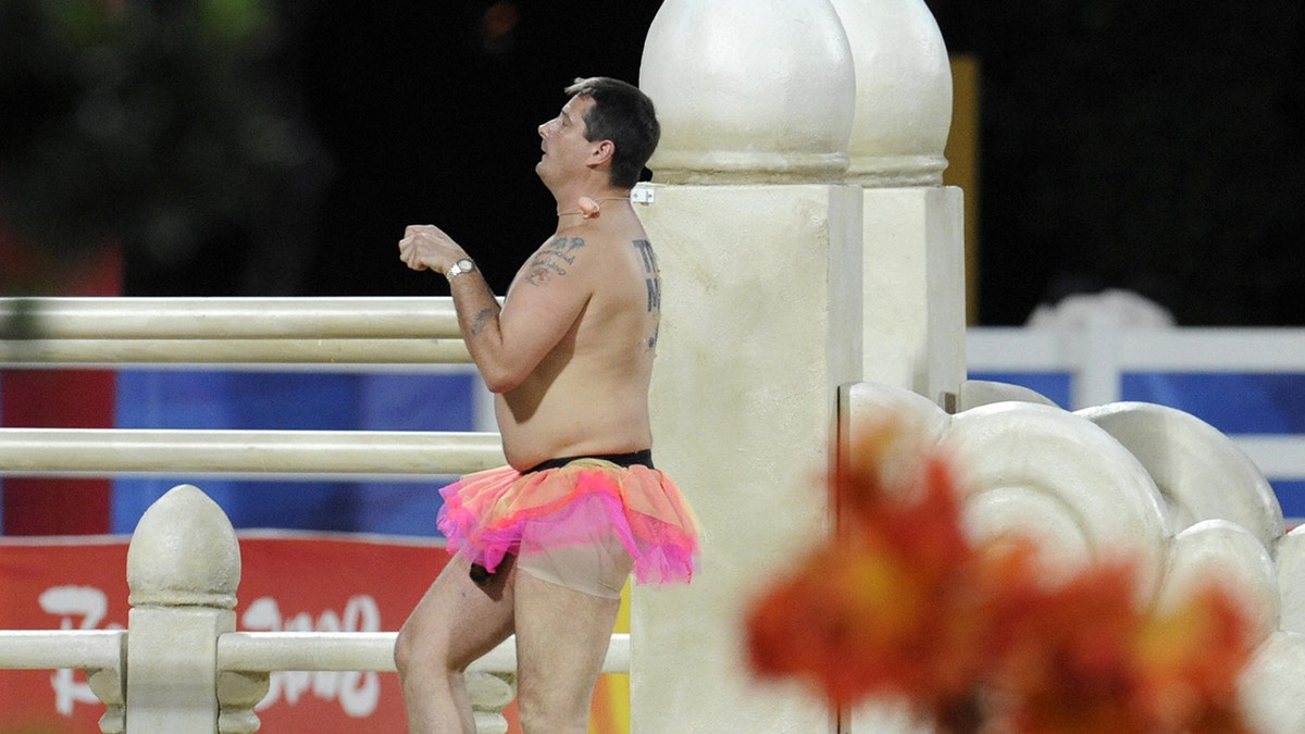 British streaker Mark Roberts "performs" during the jumping individual final of the 2008 Beijing Olympic Games on August 21, 2008 in Hong Kong.