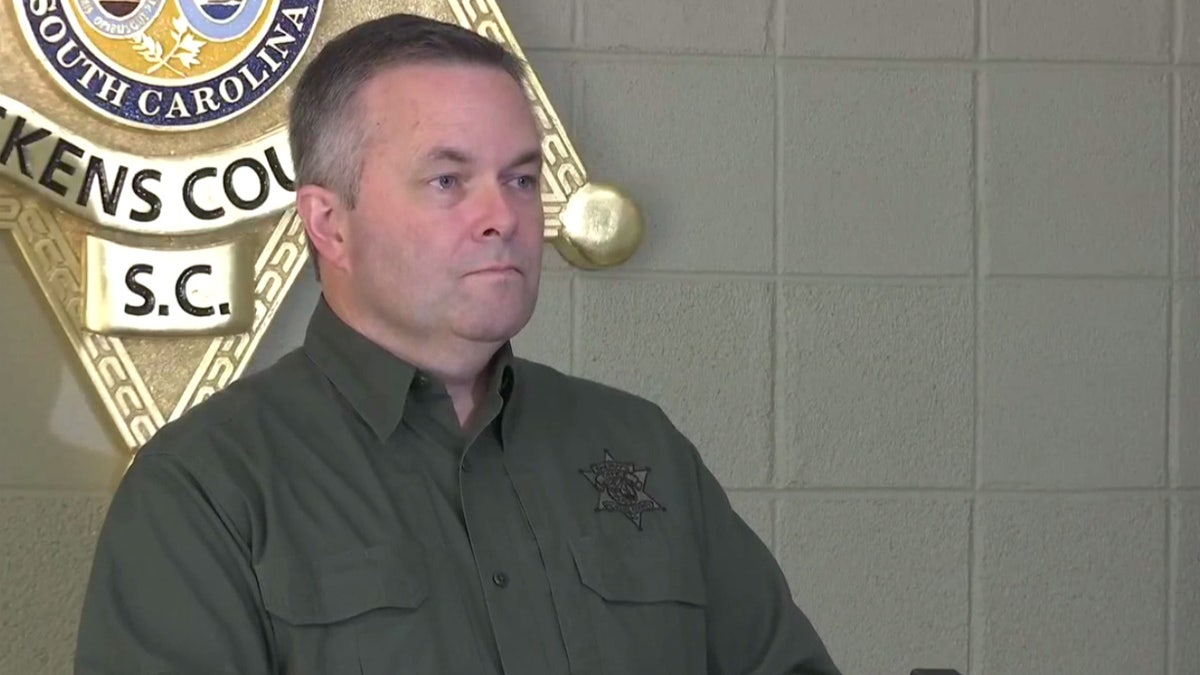 Pickens County Sheriff Rick Clark says the woman who shot and killed the other prison escapee was "a hero" to the department.