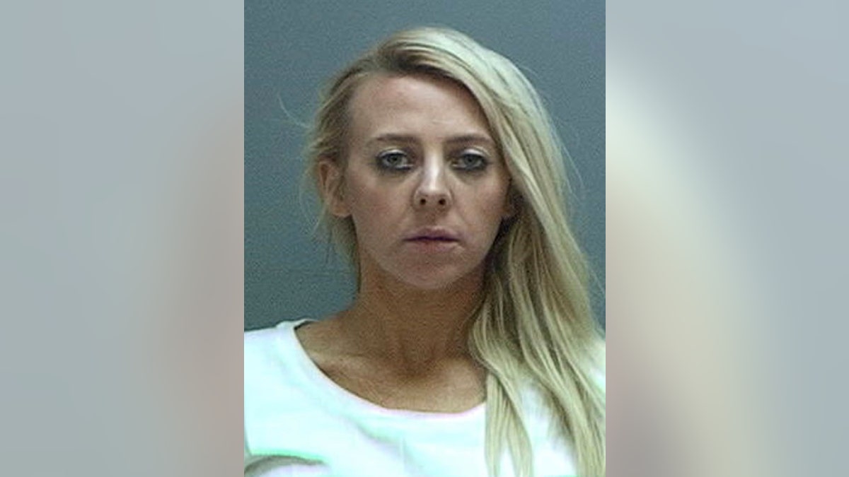 Chelsea Watrous Cook, a Utah high school teacher, shot and killed her ex-husband's girlfriend while the former couple's children looked on, police say. (Salt Lake County Sheriff's Office via AP)