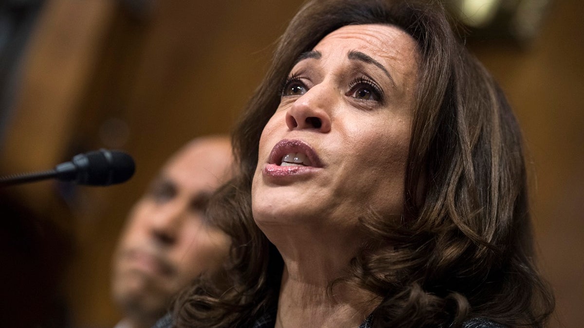 Sen. Kamala Harris, D-Calif., listens to Christine Blasey Ford testify during the Senate Judiciary Committee hearing on the nomination of Brett Kavanaugh to be an associate justice of the Supreme Court in Washington. (Tom Williams/Pool Photo via AP)