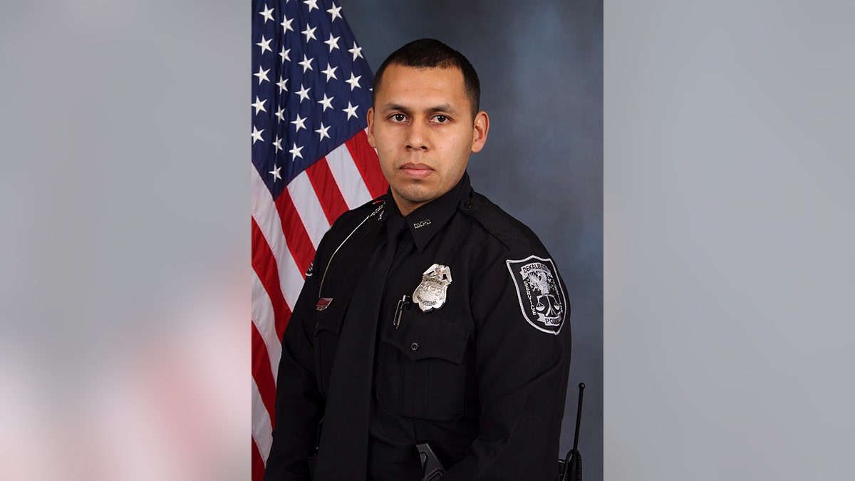 DeKalb County police Officer Edgar Isidro Flores was gunned down after a traffic stop and foot chase east of Atlanta on Dec. 13.