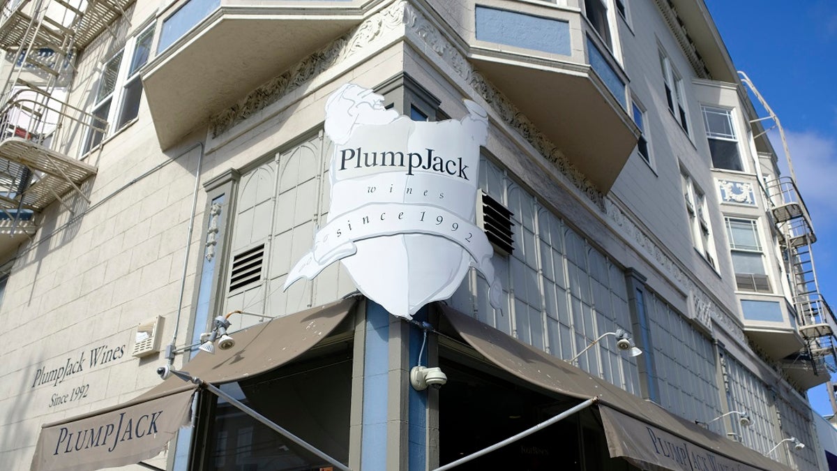 FILE - In this Monday, Oct. 22, 2018 file photo shows the Plumpjack Wine &amp; Spirits store, in San Francisco, part of the Plumpjack Group collection of wineries, bars, restaurants, hotels and liquors stores. (AP Photo/Eric Risberg, File)