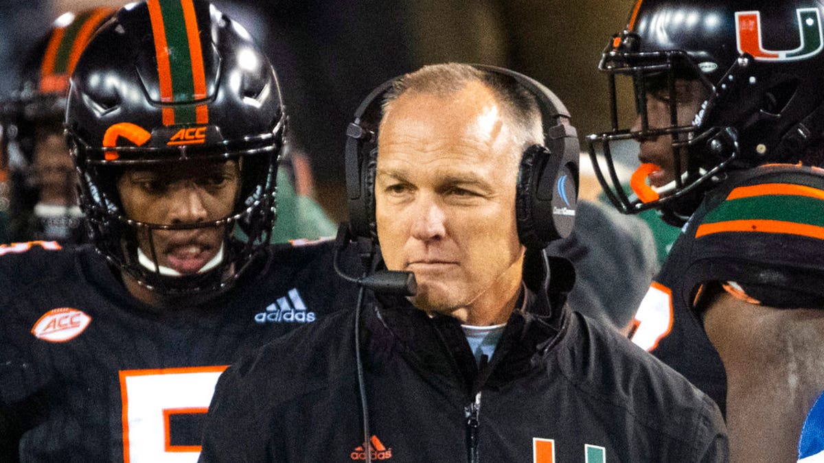 FILE: Miami coach Mark Richt walks the sideline during the second half of an NCAA college football game against Georgia Tech in Atlanta. 