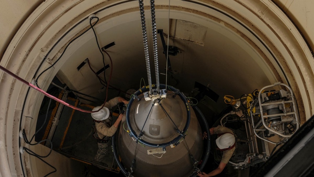 File photo - Airmen from the 90th Missile Maintenance Squadron prepare a reentry system for removal from a launch facility, Feb. 2, 2018, in the F. E. Warren Air Force Base missile complex.