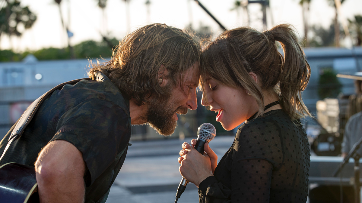 This image released by Warner Bros. shows Bradley Cooper, left, and Lady Gaga in a scene from the latest reboot of the film, "A Star is Born." The film is among the American Film Institute’s top 10 films of the year. AFI announced its selections for the 19th AFI Awards Tuesday, Dec. 4, 2018, recognizing works deemed culturally and artistically significant by a jury of AFI Trustees, scholars and critics. (Neal Preston/Warner Bros. via AP)