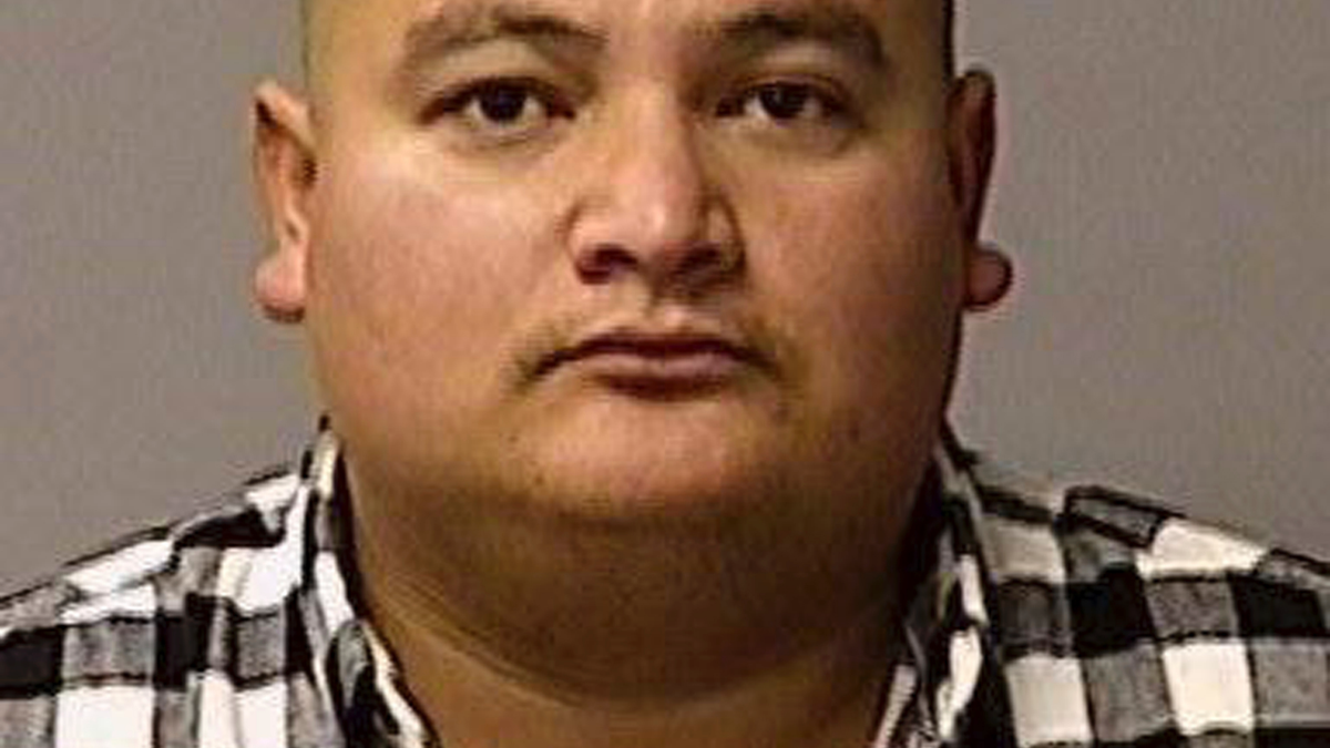 This booking photo provided by the Stanislaus County Sheriff's Department shows Paulo Virgen Mendoza. Mendoza, suspected of gunning down a California policeman, was in the U.S. illegally and was captured while planning to flee to his native Mexico. (Courtesy of Stanislaus County Sheriff's Department via AP)