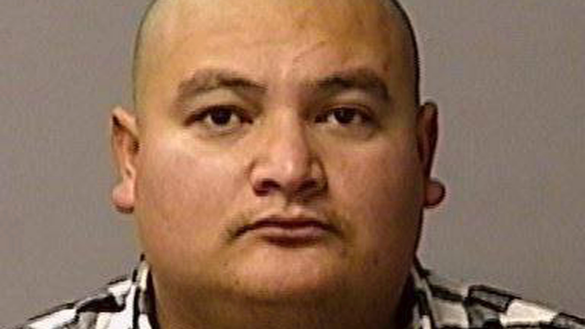 This booking photo provided by the Stanislaus County Sheriff's Department shows Paulo Virgen Mendoza. Mendoza, suspected of gunning down a California policeman, was in the U.S. illegally and was captured while planning to flee to his native Mexico. (Courtesy of Stanislaus County Sheriff's Department via AP)