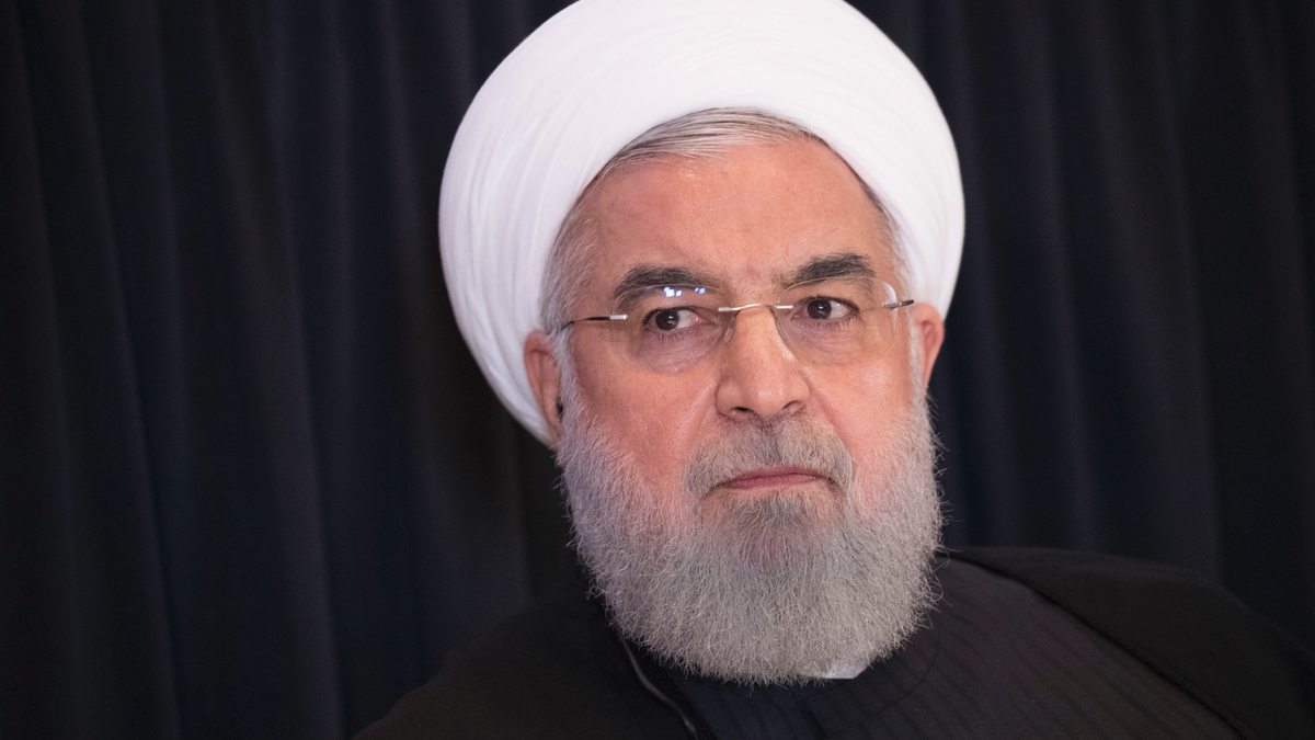 FILE - In this Sept. 26, 2018, file photo, Iranian President Hassan Rouhani speaks during a news conference in New York. President Rouhani is warning Western countries that they will face a massive influx of drugs if Iran becomes weakened by U.S. sanctions. Rouhani spoke in Tehran on Saturday, Dec. 8, 2018, at a six-nation conference on fighting terrorism attended by parliament speakers of Afghanistan, Iran, Pakistan, Turkey, China and Russia. (AP Photo/Mary Altaffer, File)