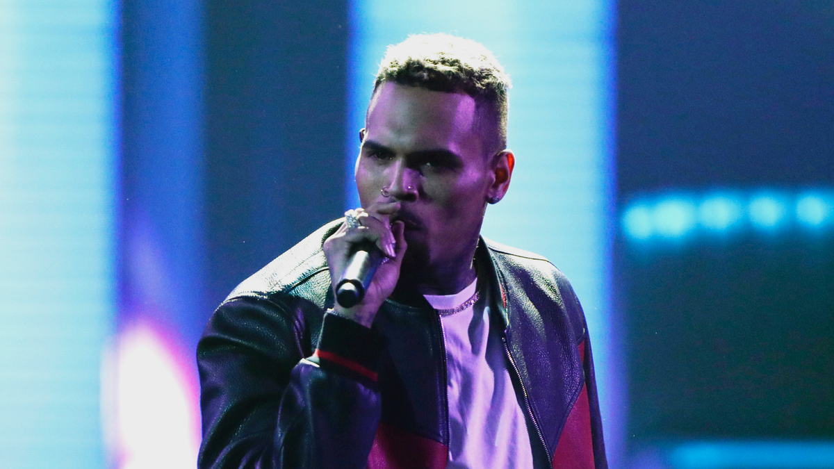 FILE - In this June 25, 2017, file photo, Chris Brown performs at the BET Awards at the Microsoft Theater in Los Angeles. Brown released a 45-song album "Heartbreak on a Full Moon" on Tuesday, Oct. 31. Brown has been charged with monkey-related misdemeanors. The Los Angeles city attorney's office confirms Thursday, Dec. 27, 2018, that the 29-year-old singer was charged last week with two counts stemming from his possession of a pet capuchin monkey without a permit. (Photo by Matt Sayles/Invision/AP, File)
