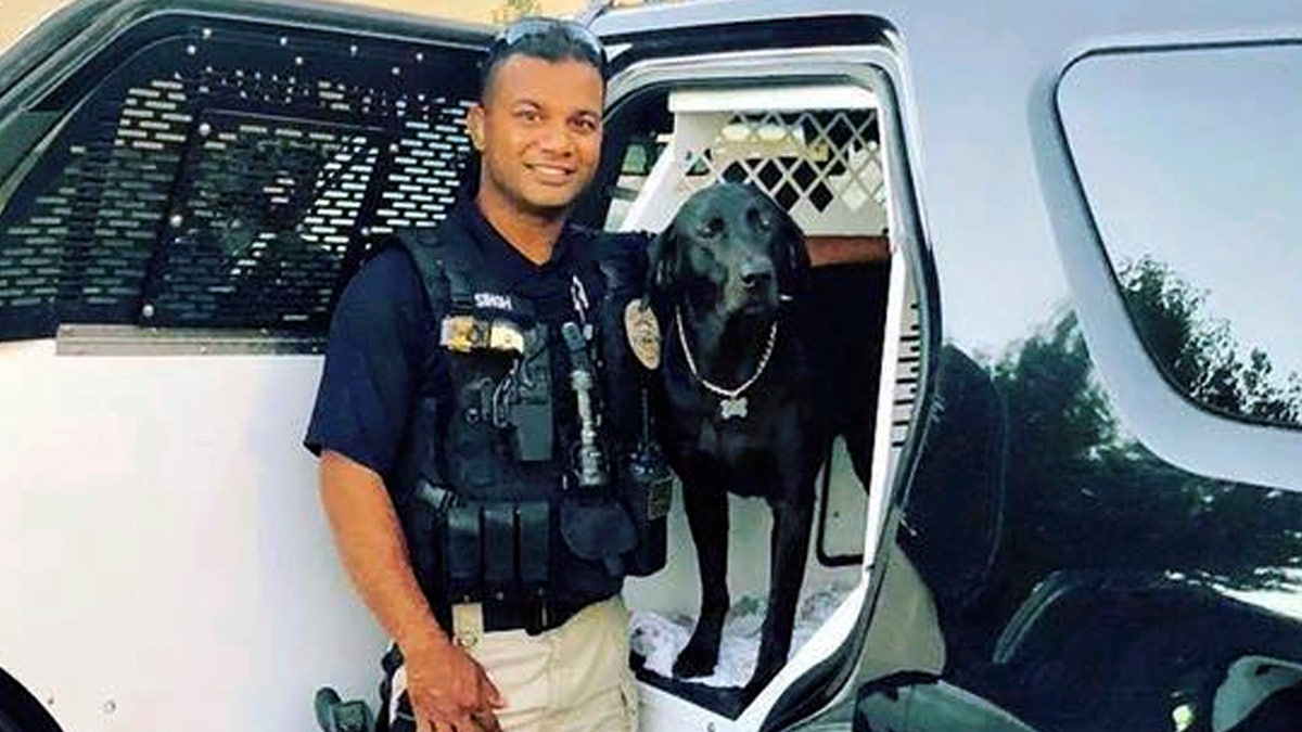 This undated photo provided by the Newman Police Department shows officer Ronil Singh of Newman Police Department.