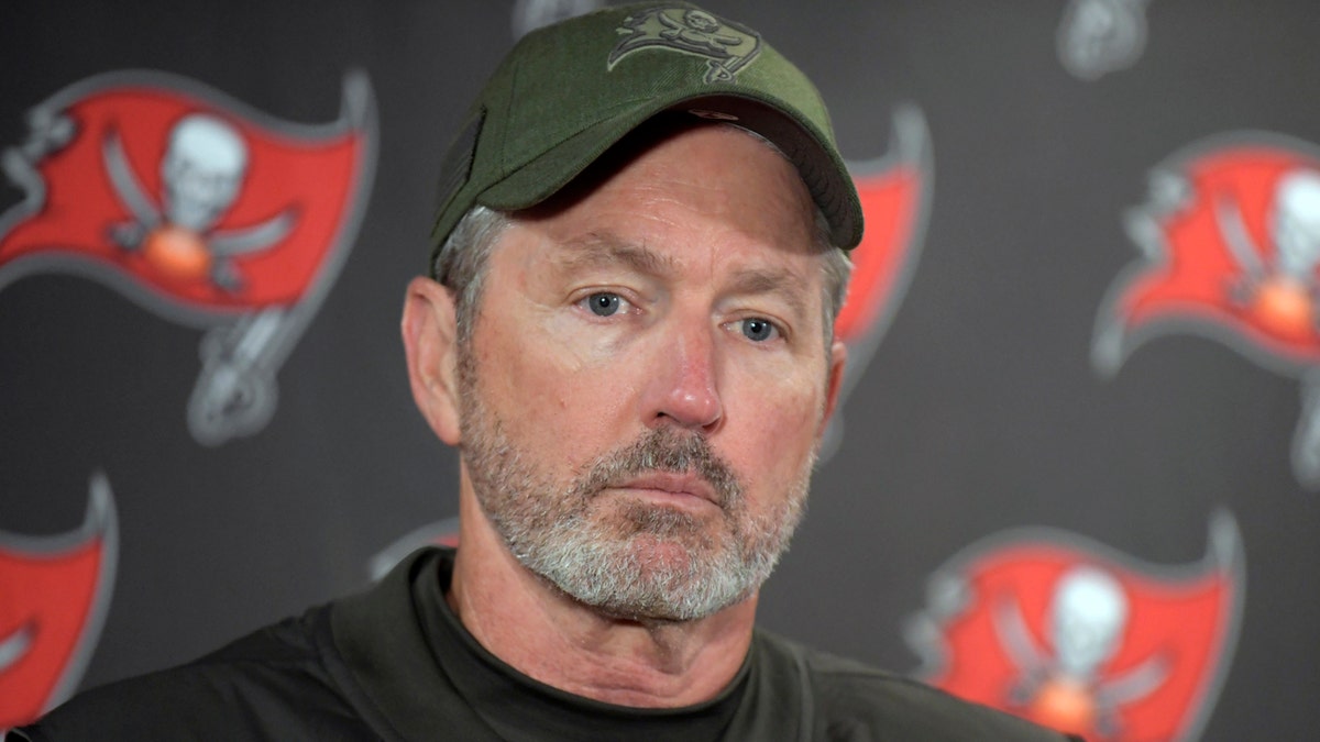 FILE - In this Sunday, Nov. 18, 2018 file photo, Tampa Bay Buccaneers head coach Dirk Koetter talks to reporters after an NFL football game against the New York Giants in East Rutherford, N.J.