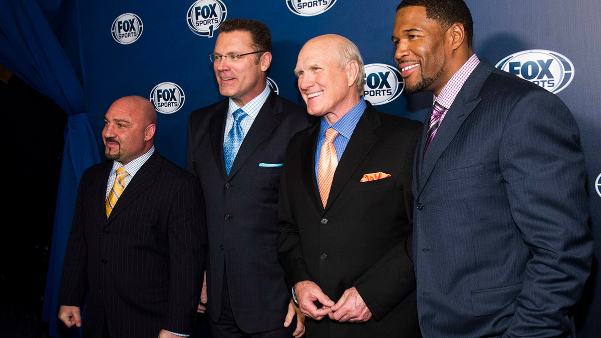 From left, Jay Glazer, Howie Long, Terry Bradshaw and Michael Strahan attend the Fox Sports Media Upfront party celebrating the new Fox Sports 1 network in New York, March 5, 2013. (Associated Press)