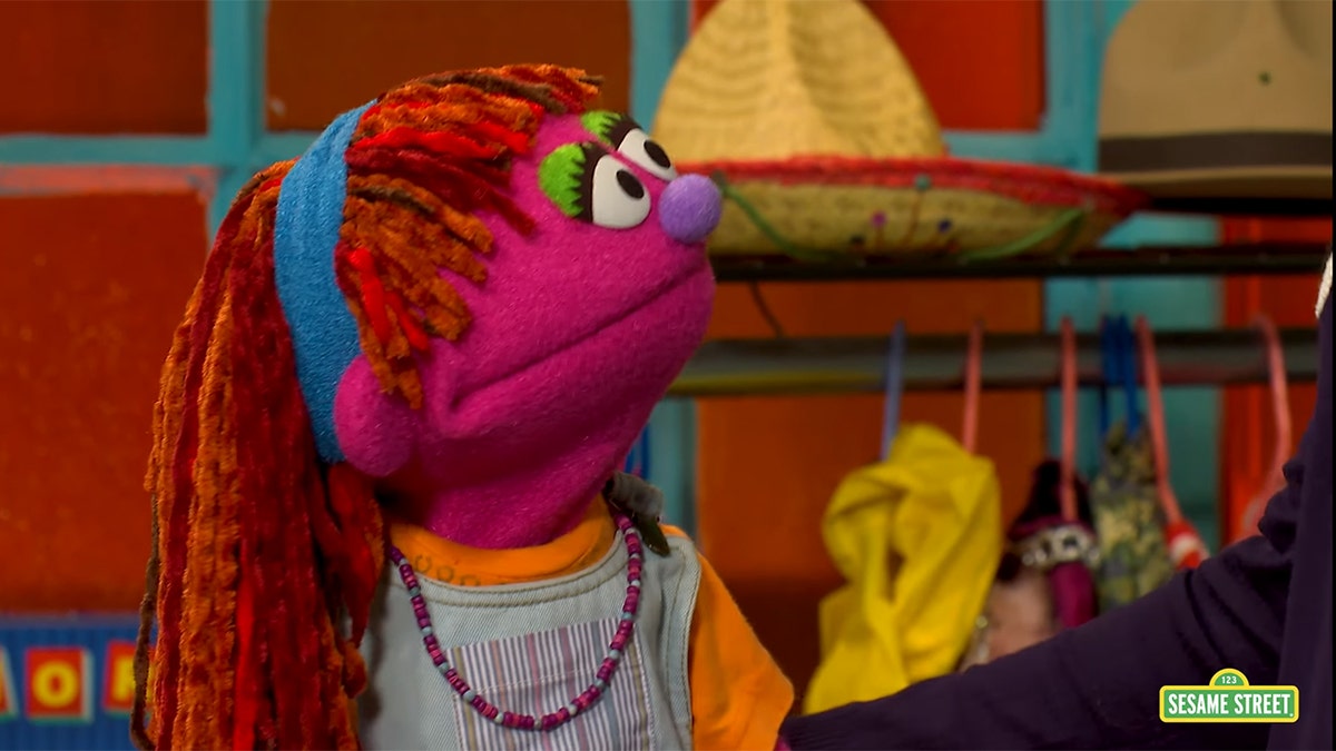 Lily discusses homelessness on "Sesame Street." 