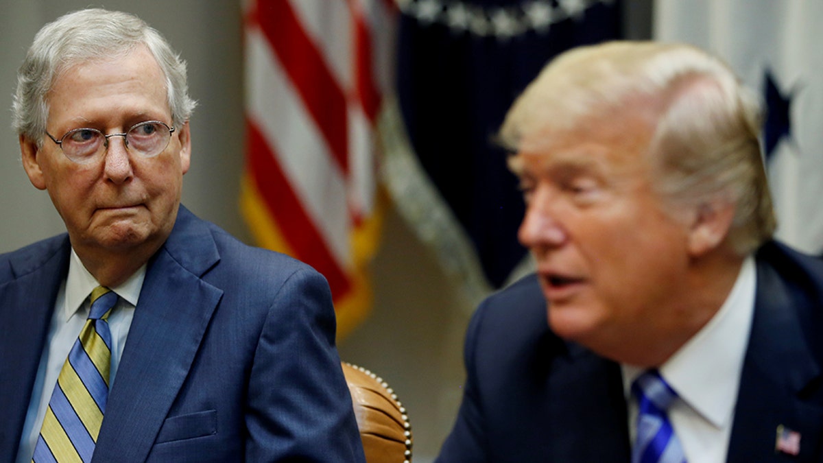 Senate Majority Leader Mitch McConnell listens to U.S. President Donald Trump as the President holds a meeting with Republican House and Senate leadership in the Roosevelt Room at the White House in Washington, D.C., U.S. Sept. 5, 2018.
