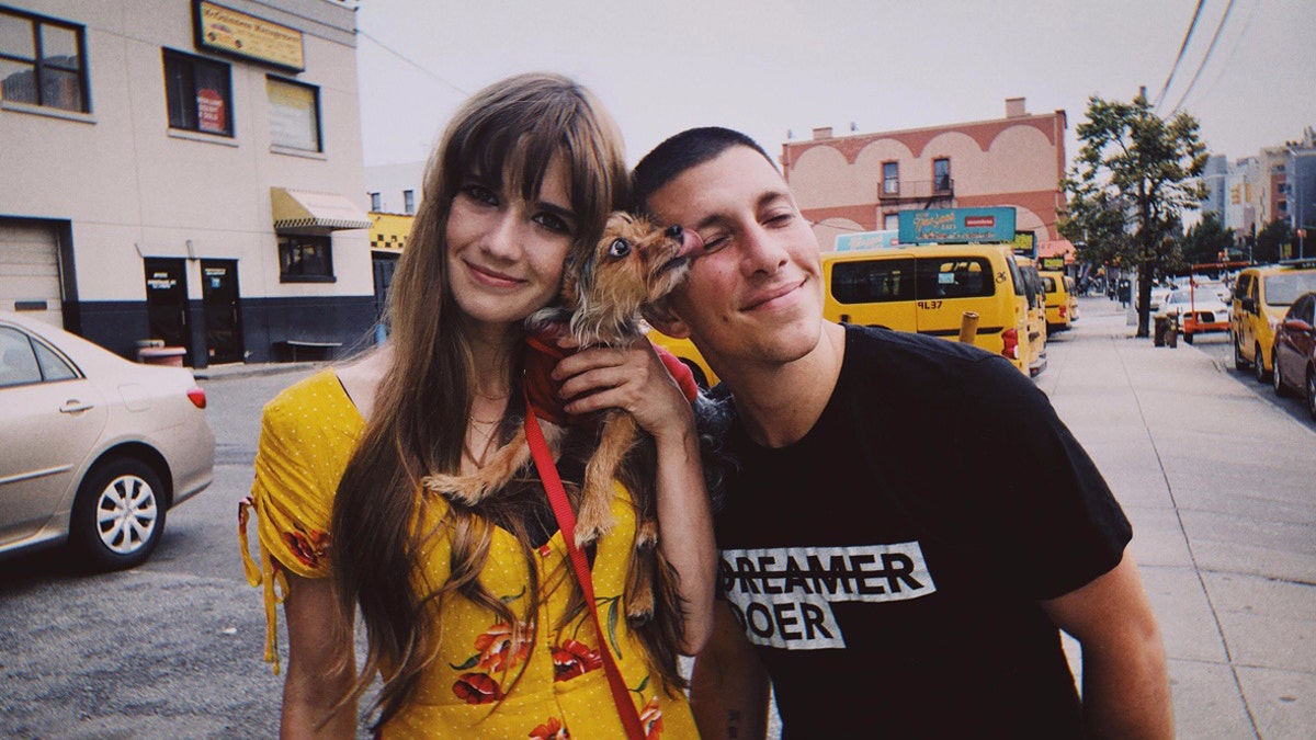 Lexi and Nick with Sarah's dog, Toto. They both now have jobs and are trying to get permanent housing.