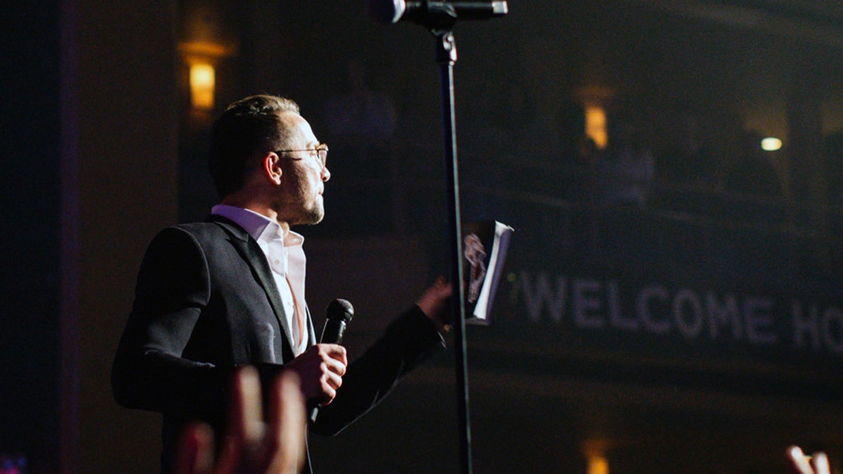Carl Lentz, Hillsong Church NYC lead pastor, gave a special message to Darnell's father at the close of the service.