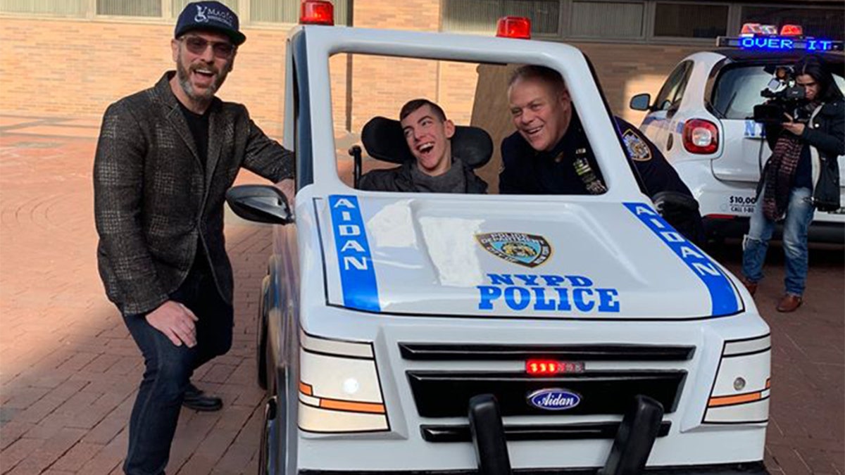 The teen’s father, Officer Merrit Riley, told WABC-TV that he “can’t put into words what it means” for his son to have received this gift from nonprofit organization Magic Wheelchair.