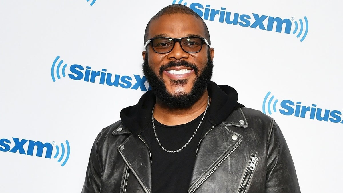 Tyler Perry successful glasses connected a reddish carpet