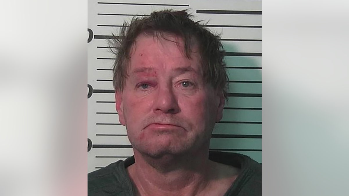 Randal Dickinson allegedly fired 16 rounds at his roommate, police say.