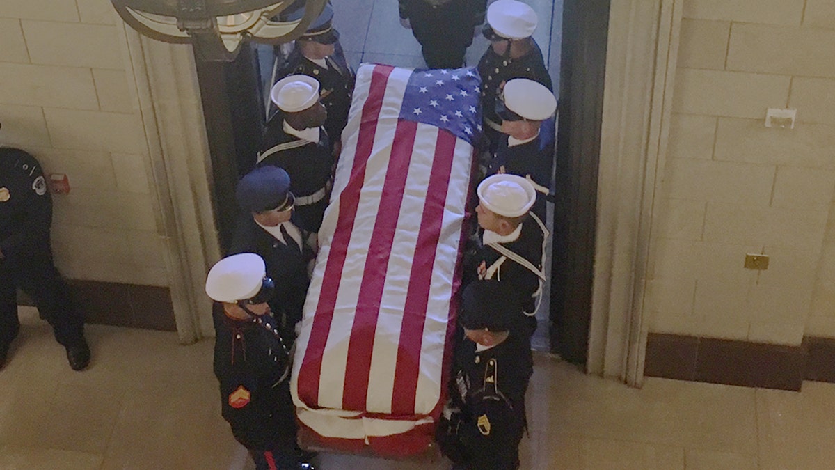 President Trump, first lady visit George H.W. Bush's casket at US ...
