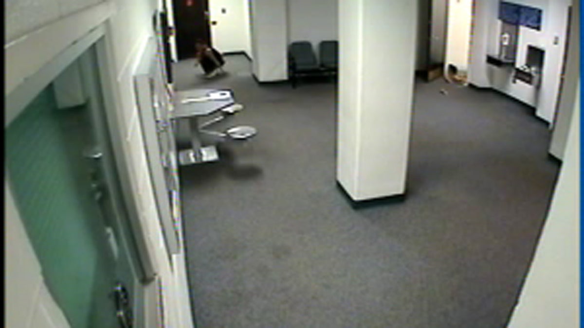 Jessica Leger can be seen dropping from the ceiling into the lobby of the Jefferson County Jail.