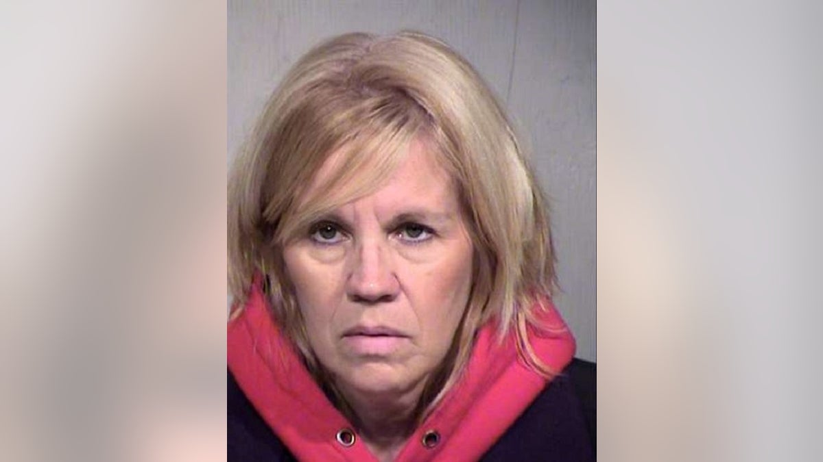 Deborah Britton, of Chandler, Ariz., is charged with unlawful distribution of nude images and harassment, a report said.