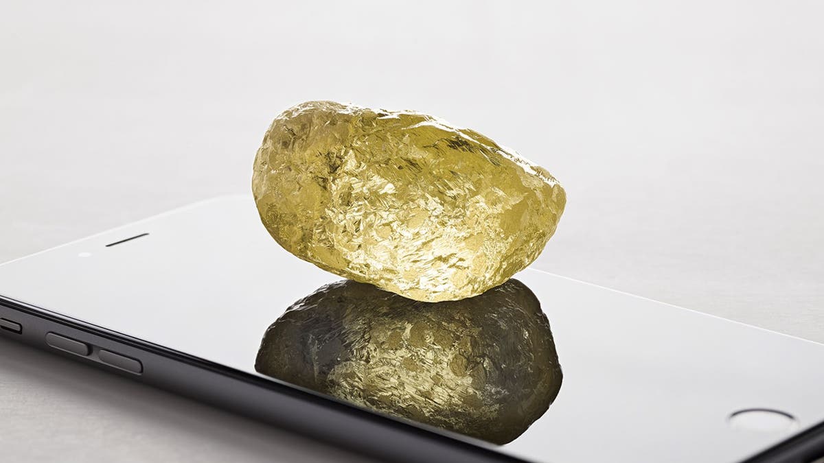 The yellow diamond is about the size of a chicken egg--