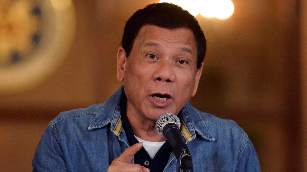 Duterte gestures while speaking during a news conference at the presidential palace in Manila in 2017. 