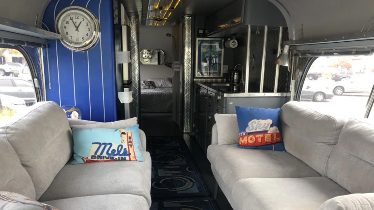 The refurbished bus was the most recent in efforts by Woody Faircloth to help families displaced by the blaze.
