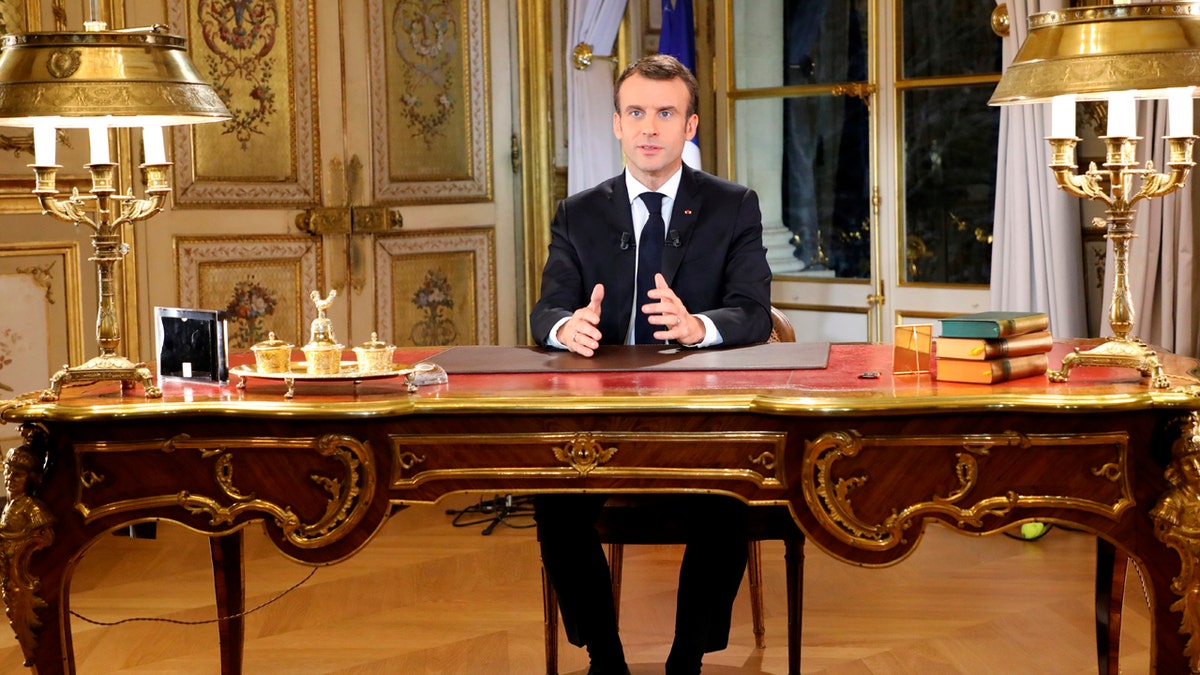 Facing exceptional protests, French President Emmanuel Macron is promising to speed up tax relief for struggling workers and to scrap a tax hike for retirees.