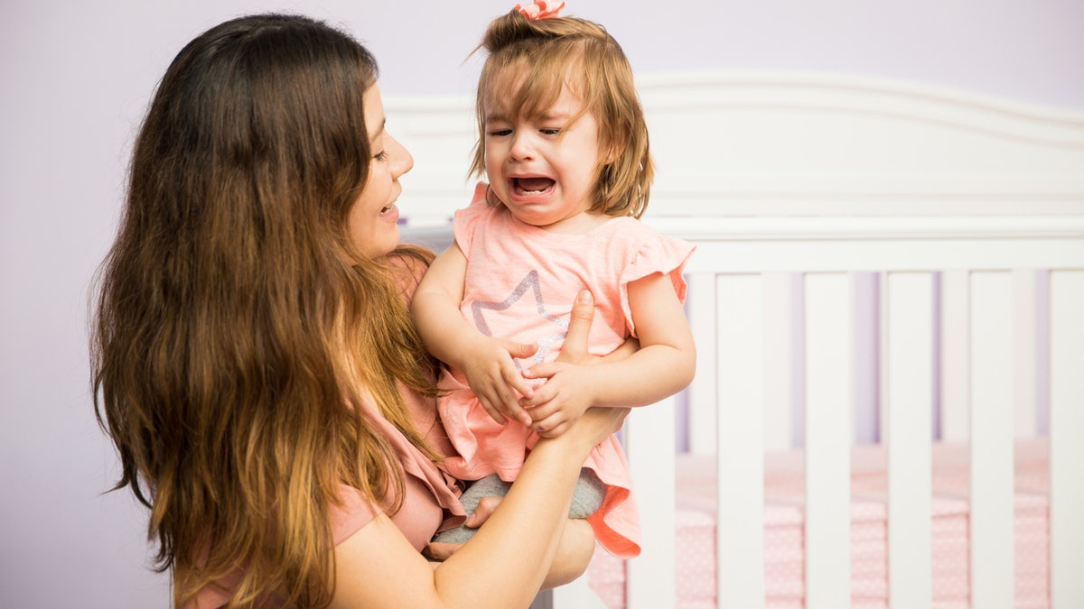 mom calming upset toddler