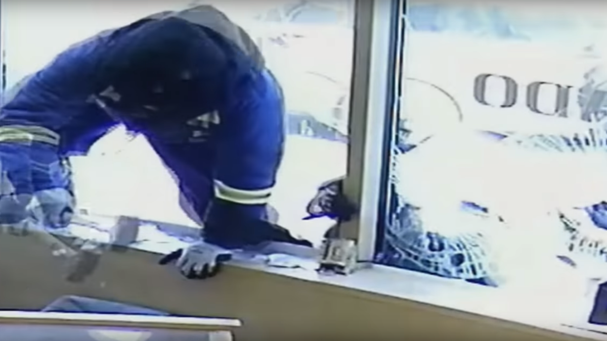 Employees at Ashok Jewelers were captured on surveillance video fending off would-be robbers with swords.