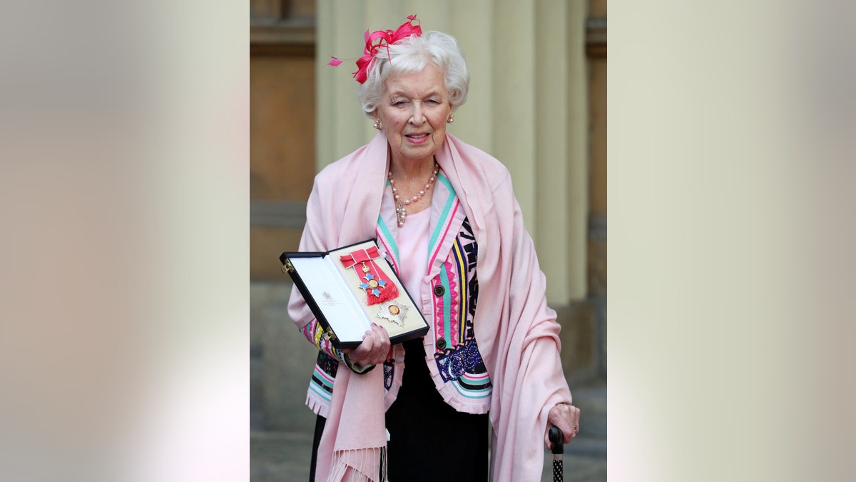 FILE - Nov. 16, 2017 file photo of Dame June Whitfield after she was made a dame. British actress and comedic star June Whitfield, whose long career included memorable roles in TV series “Absolutely Fabulous” and “Terry and June,” has died. She was 93. (Jonathan Brady/PA Wire/PA via AP, File)