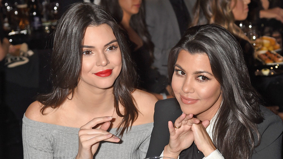 LOS ANGELES, CA - MARCH 14: TV personalities Kendall Jenner (L) and Kourtney Kardashian attend The Comedy Central Roast of Justin Bieber at Sony Pictures Studios on March 14, 2015 in Los Angeles, California. The Comedy Central Roast of Justin Bieber will air on March 30, 2015 at 10:00 p.m. ET/PT. (Photo by Jeff Kravitz/FilmMagic)