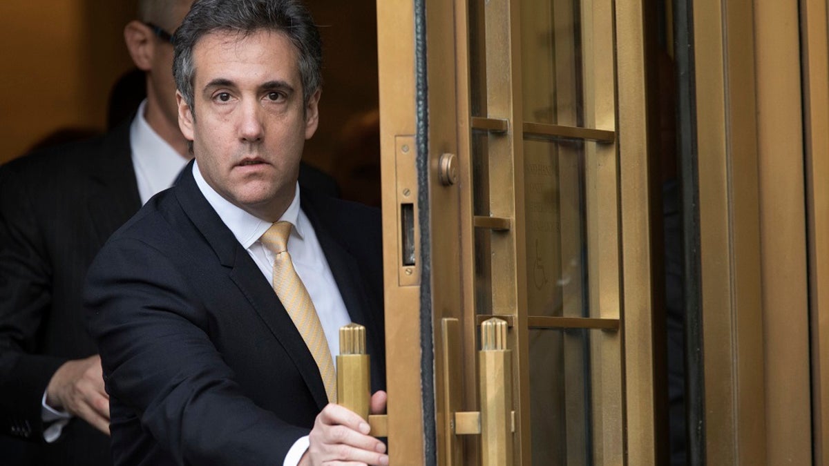 Michael Cohen leaves Federal court, in New York.