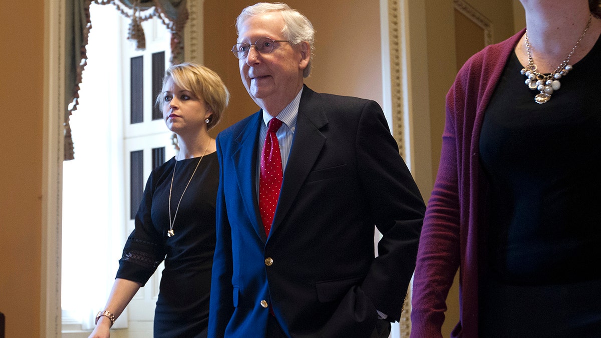 Senate Majority Leader Mitch McConnell, R-Ky., returns to the Capitol from the White House as work to avoid a partial government shutdown continued with President Trump demanding funds for a wall along the U.S.-Mexico border, at the Capitol in Washington, Friday, Dec. 21, 2018. (Associated Press)