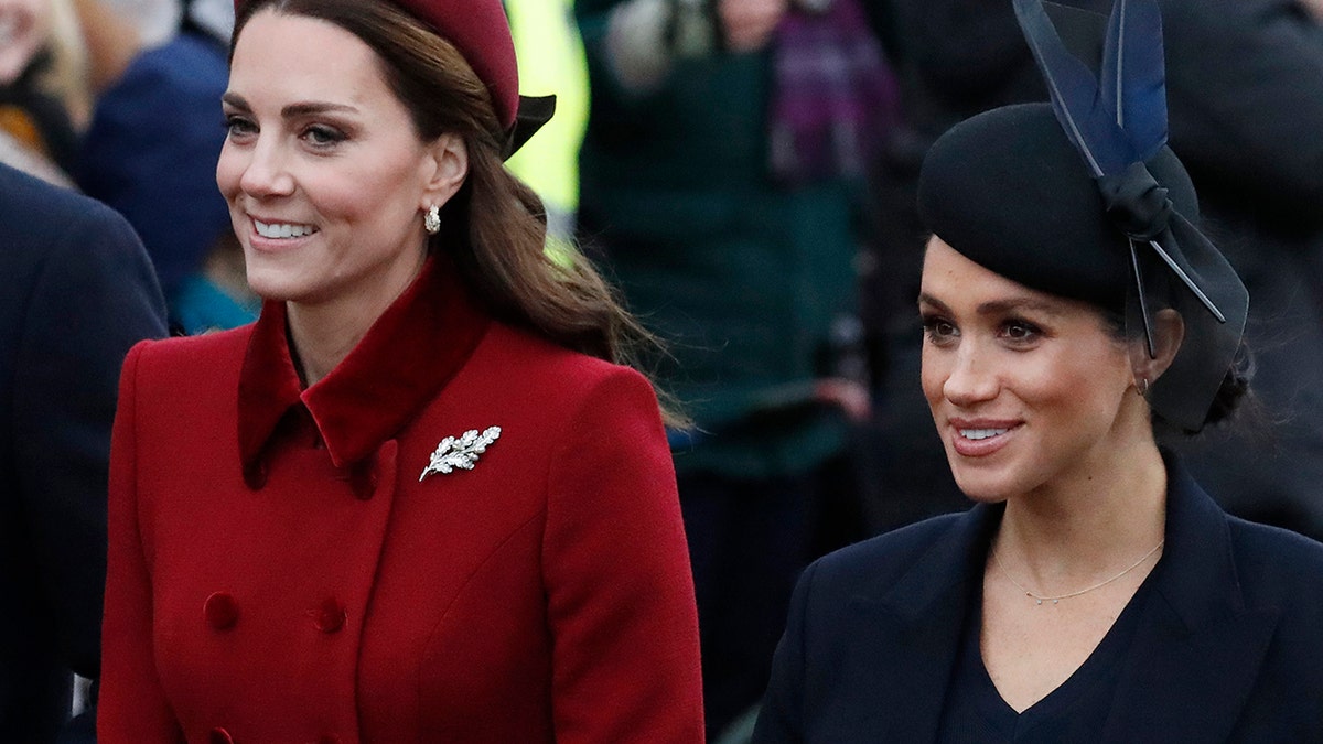 Britain's Kate, Duchess of Cambridge, left, and Meghan Duchess of Sussex, right, are all smiles before attending the Christmas day service at St Mary Magdalene Church in Sandringham in Norfolk, England, Tuesday, Dec. 25, 2018.