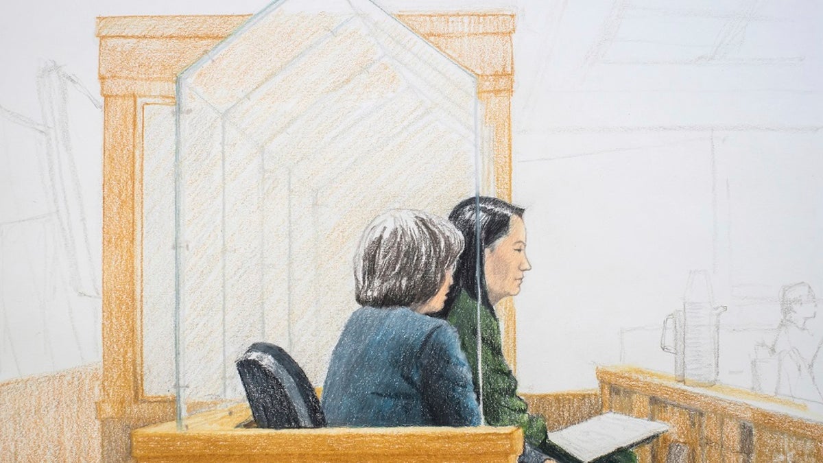 Meng Wanzhou, right, attends a bail hearing at British Columbia Supreme Court in Vancouver on Friday, Dec. 7, 2018.