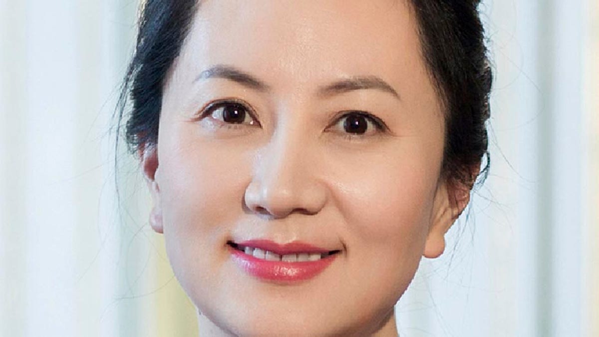 In this undated image released by Huawei, Huawei's chief financial officer Meng Wanzhou is seen in a portrait photo.
