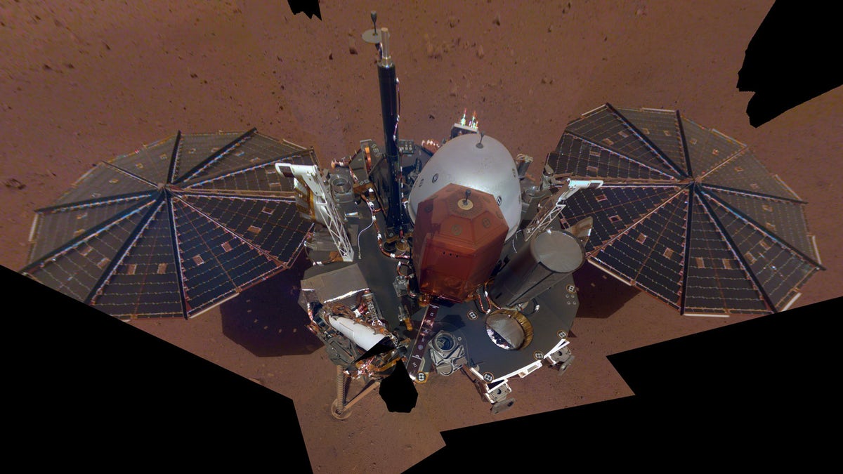The first selfie taken by NASA’s InSight lander on Mars. The 11-image composite, which was released on Dec. 11, 2018, shows the lander's solar panels and deck.