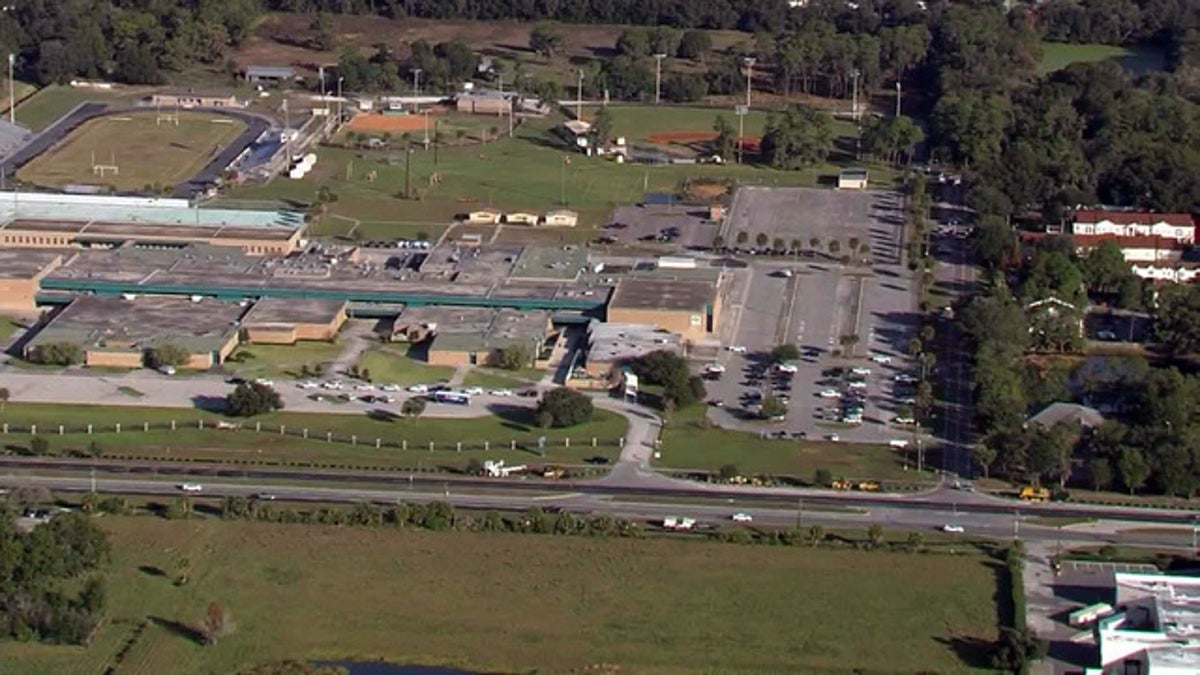 A Hillsborough County sheriff’s deputy killed three family members before he killed himself near a Florida high school on Wednesday, police said.