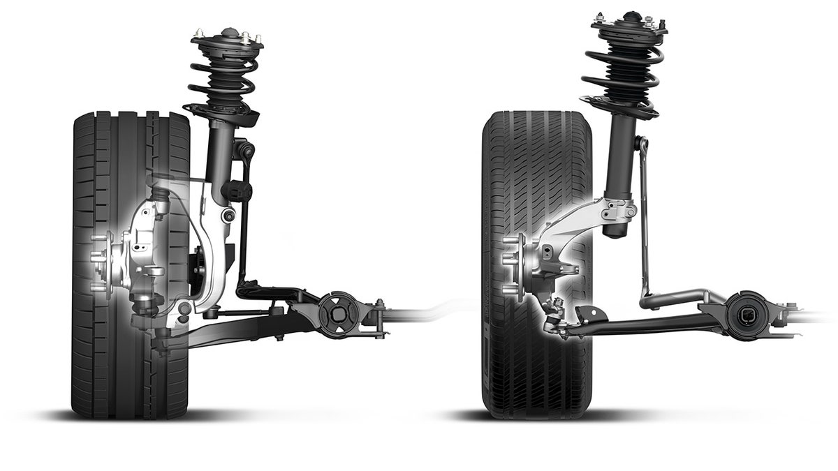 The Type R front suspension (right) is dramatically different than the standard Civic design (left).