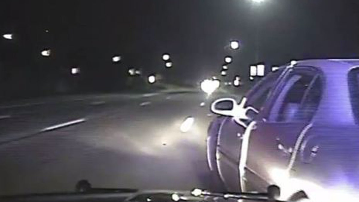 Wyoming Police Officer Tony Jacob used his patrol car to nudge another vehicle to get it to stop.