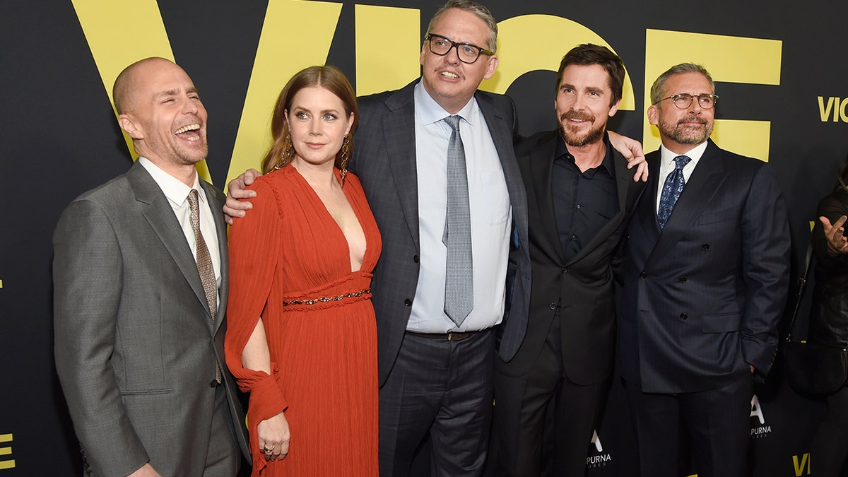 Sam Rockwell, from left, Amy Adams, writer/director Adam McKay, Christian Bale and Steve Carell arrive at the world premiere of "Vice" on Tuesday, Dec. 11, 2018, at the Samuel Goldwyn Theater in Beverly Hills, Calif.