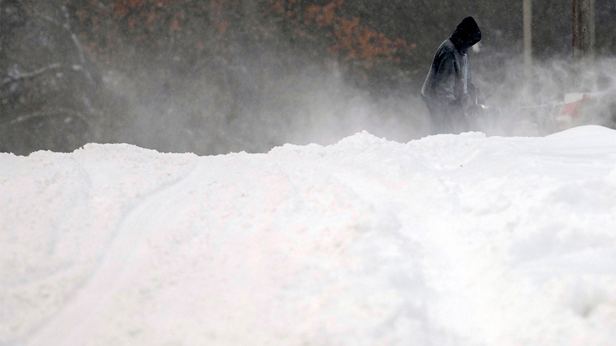 Forecasters posted a blizzard warning for parts of the Dakotas and Minnesota as a major winter storm delivered heavy snow and gusty winds to the region. (Mike McCleary/The Bismarck Tribune via AP)