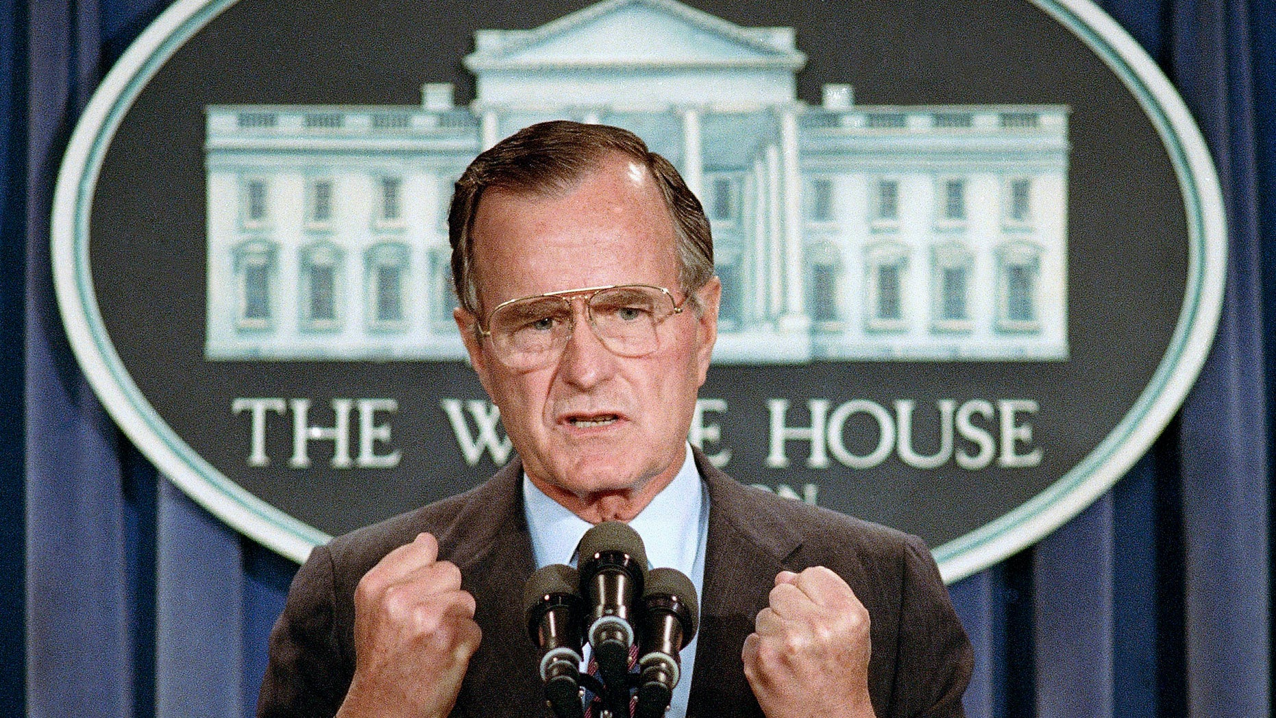 In this June 5, 1989 file photo, U.S. President George H.W. Bush holds a <a class=