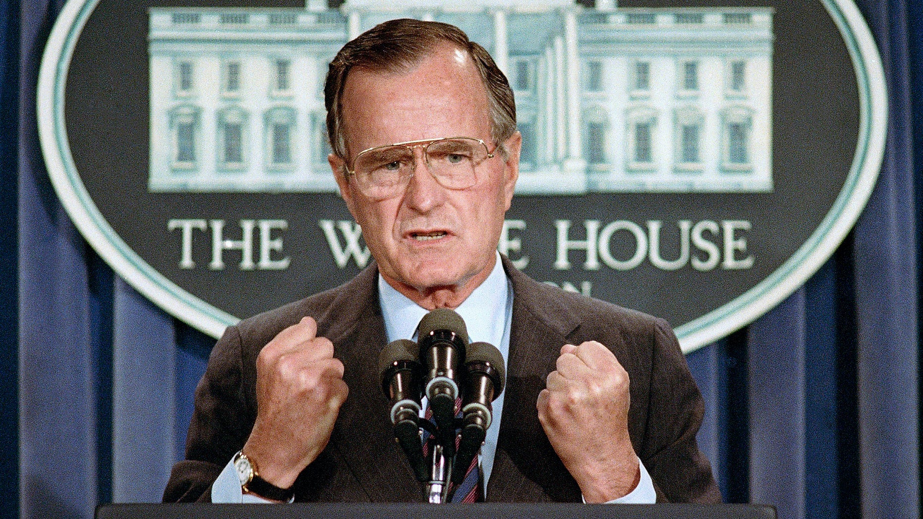news In this June 5, 1989 file photo, U.S. President George H.W. Bush holds a <a class=