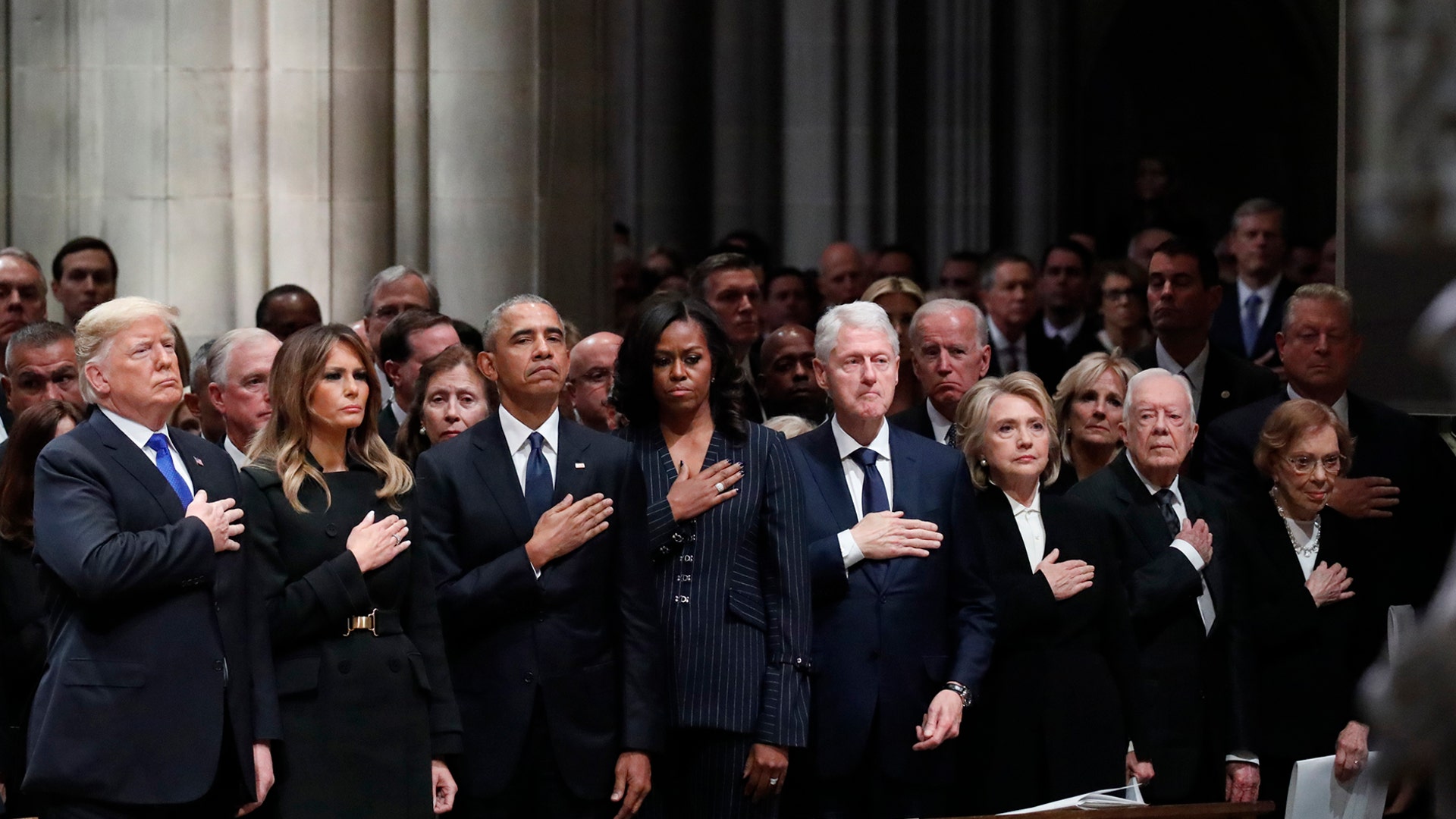 President Donald Trump, first lady Melania Trump, former President Barack Obama, former first lady Michelle Obama, former President Bill Clinton, former Secretary of State Hillary Clinton, and former President Jimmy Carter and former first lady Rosalynn Carter participate in the State Funeral for former President George H.W. Bush, at the National Cathedral in Washington, Dec. 5, 2018. (AP Photo/Alex Brandon, Pool)