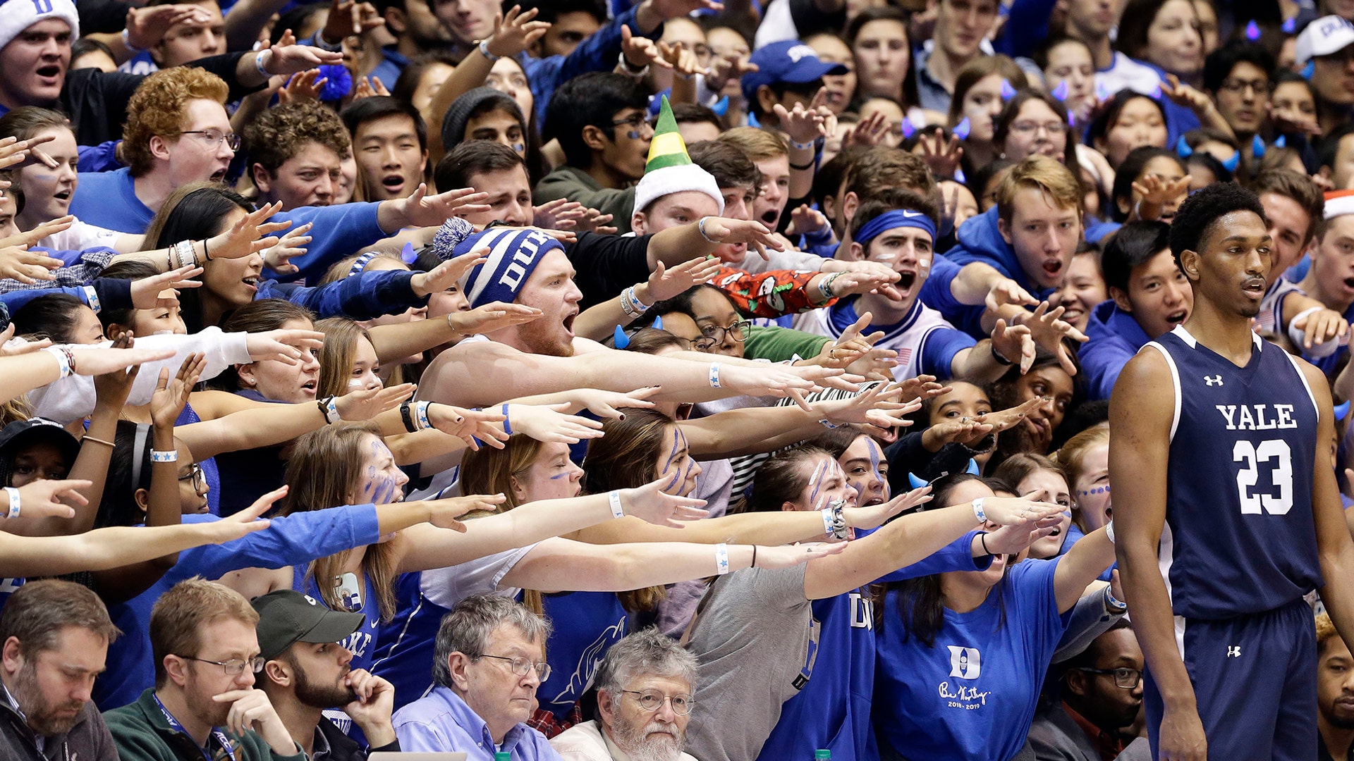 Duke fans cheer as Yale's Jordan Bruner waits to inbound the ball during the first half of an NCAA college basketball game in Durham, Dec. 8, 2018.