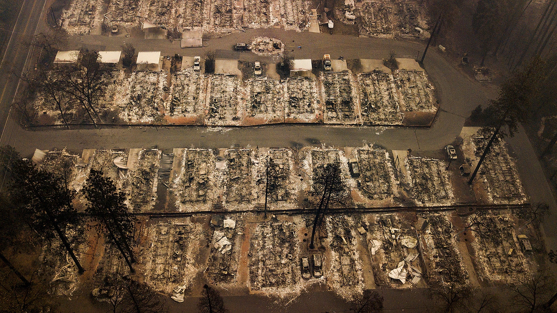 Ashes and debris are all that remain where houses once stood after a wildfire destroyed the town of Paradise, California, November 15, 2018. 
